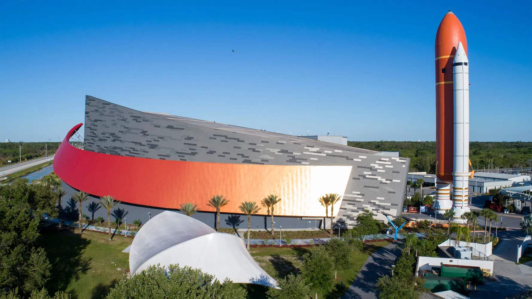 Ext gray/orange building with white/orange rocket