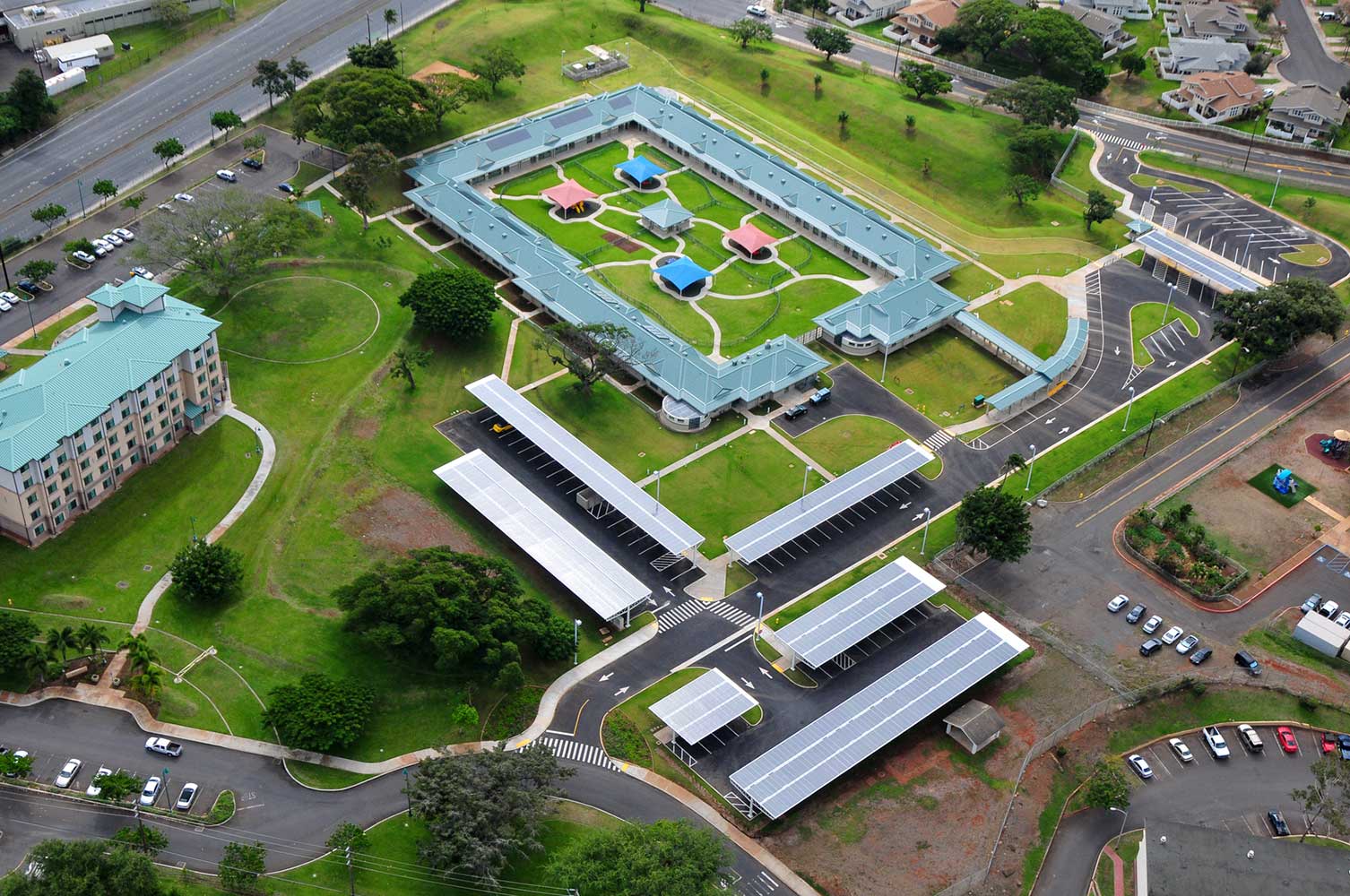 Sky view of child dev center with surrounding green landscape