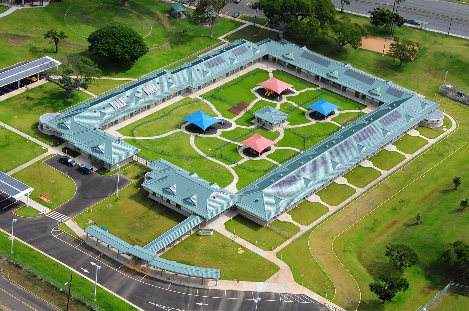 Sky view of child dev center with surrounding green landscape