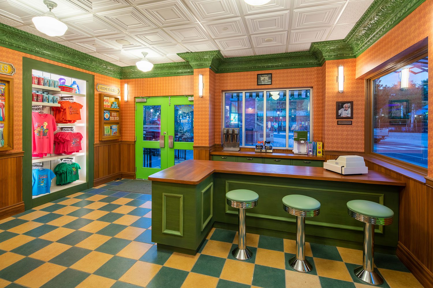 Interior of Sesame Street gift shop with check out bar and green stools
