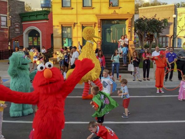 Sesame Street Land at SeaWorld Orlando showing Elmo and small children