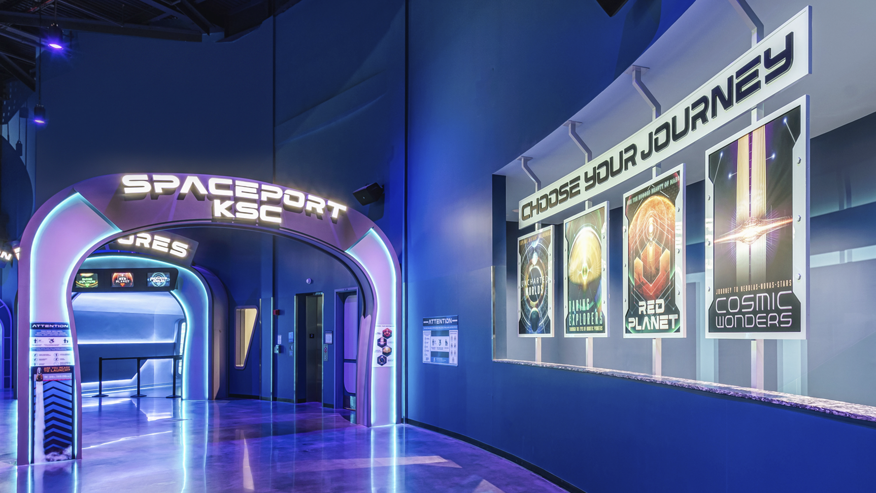 Purple room entrance with different space posters on the wall