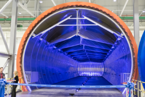 Large cylinder with purple lights inside