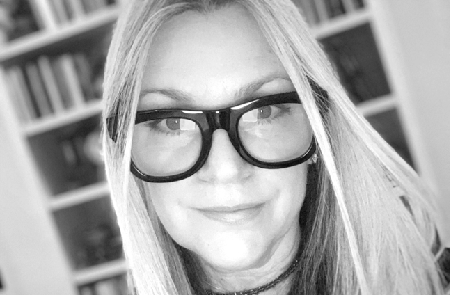 Black and white image of lady wearing glasses